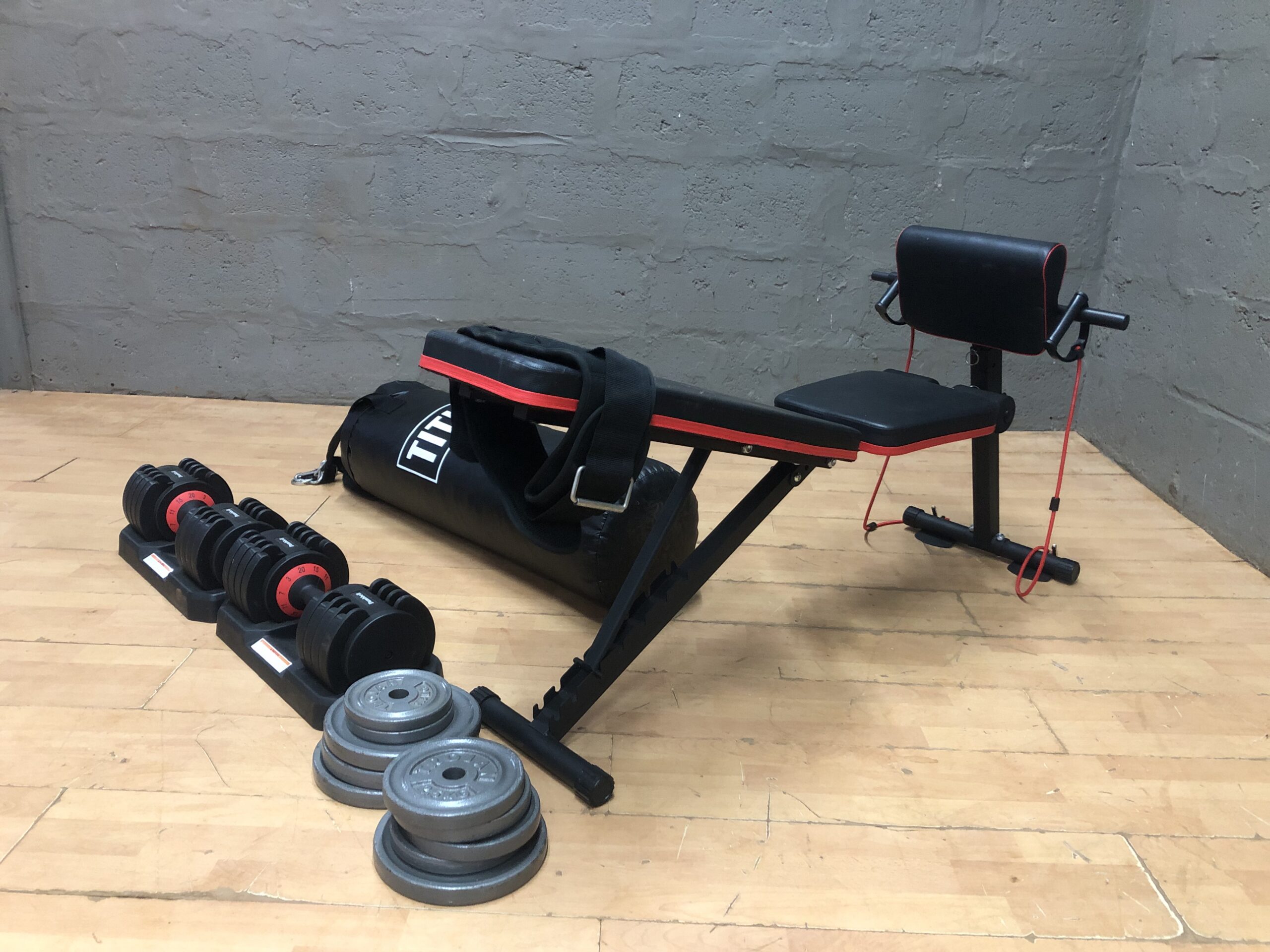 Used Home Gym Bundle: Adjustable Bench, TITLE Punching Bag, Dumbbells & Weight Plates