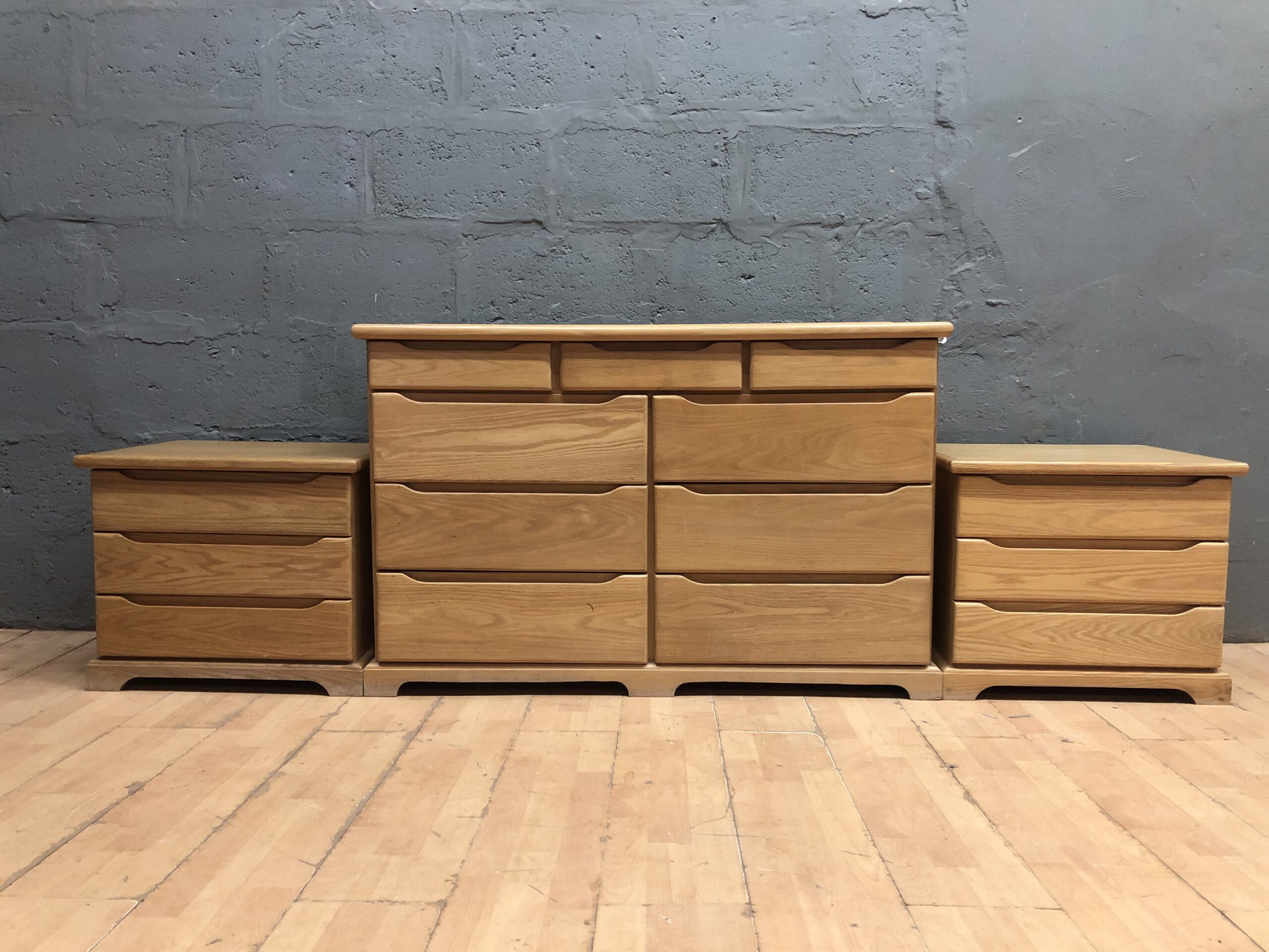 Three-piece light oak-tone bedroom set: dresser + 2 matching low chests (seller-confirmed 3)