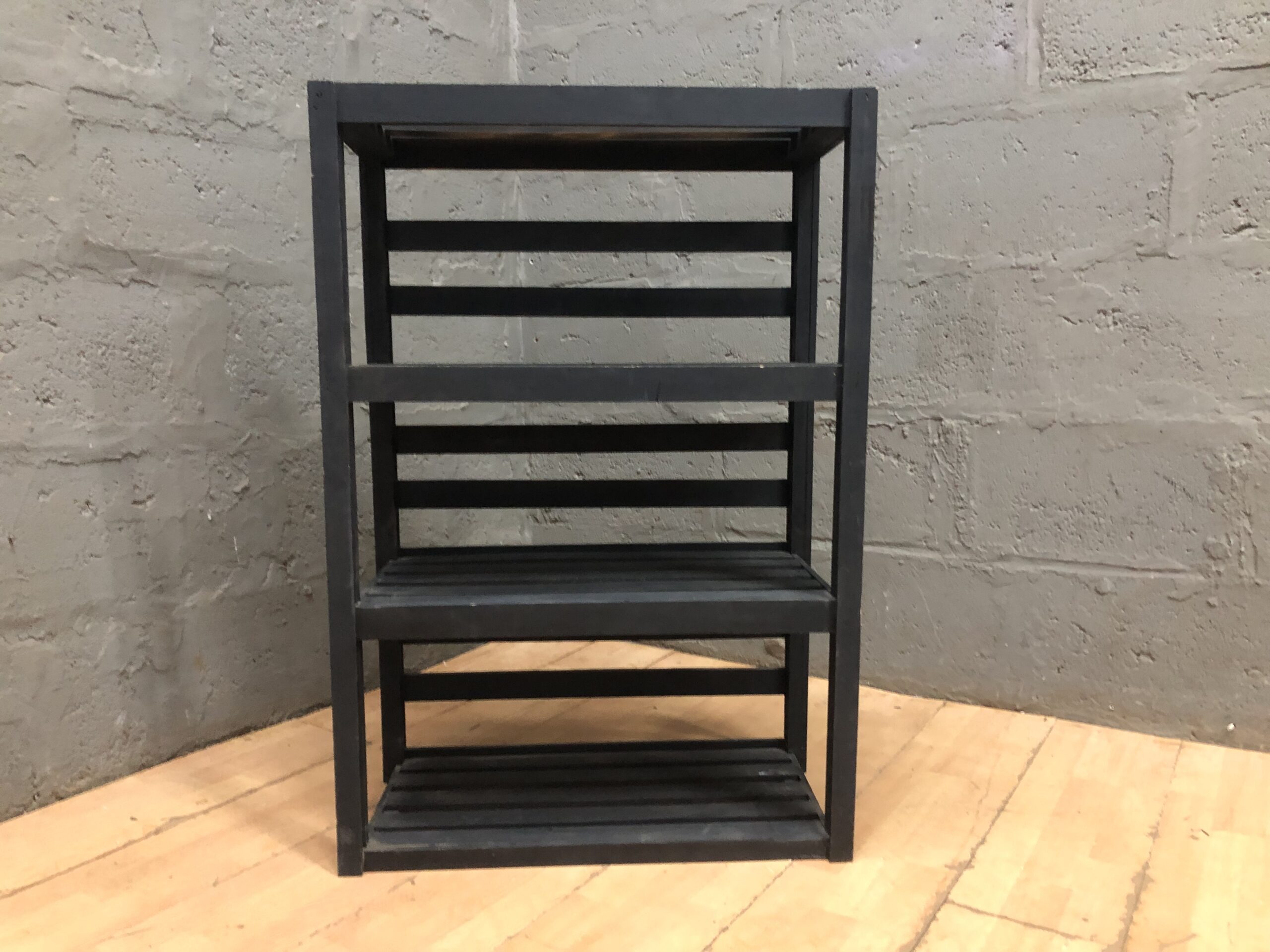 Black 4-Tier Slatted Shelf Unit — Compact Painted Wooden Shelving