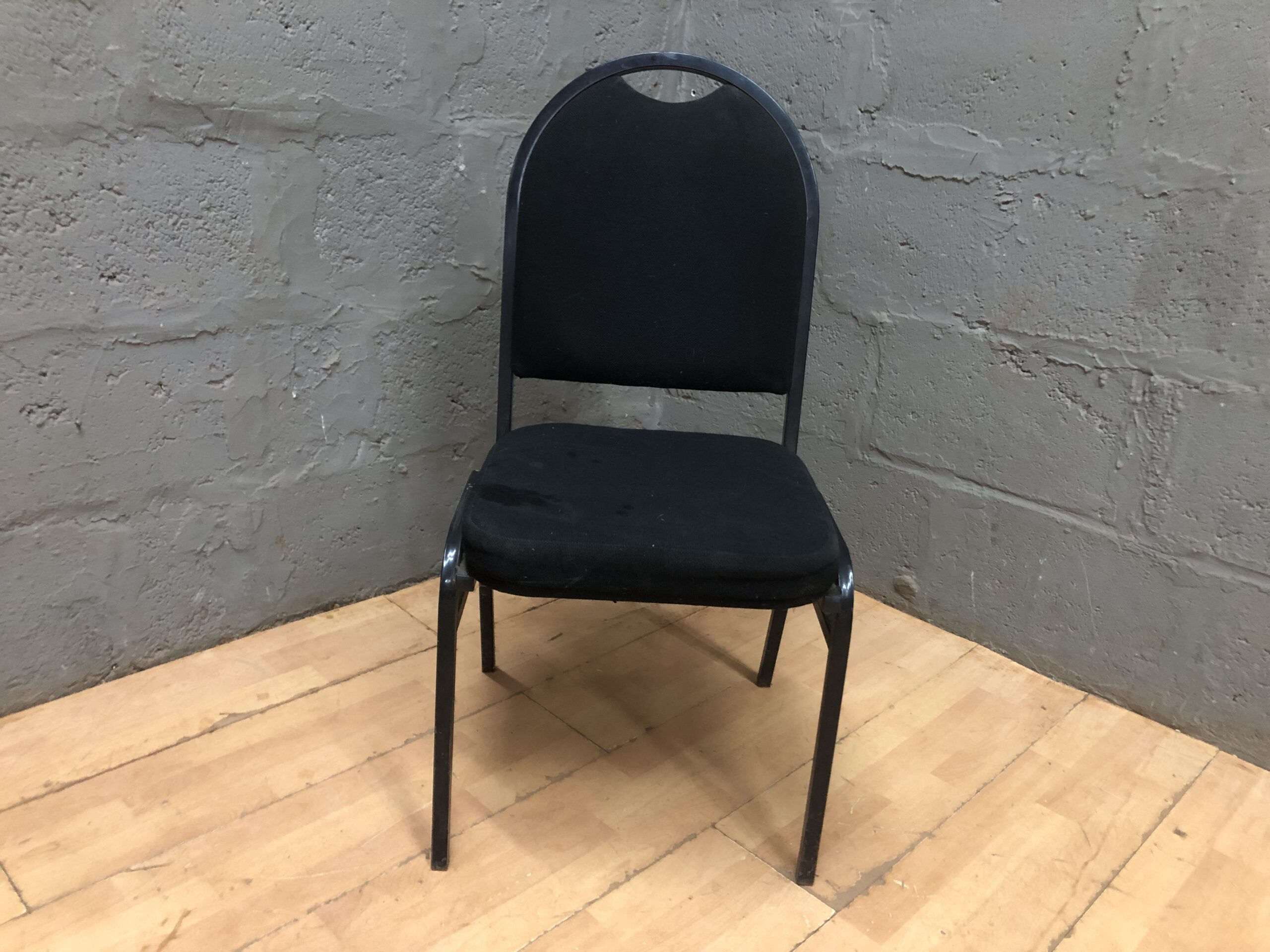Black Fabric-Upholstered Metal Frame Chair — Single Item, Needs Cleaning