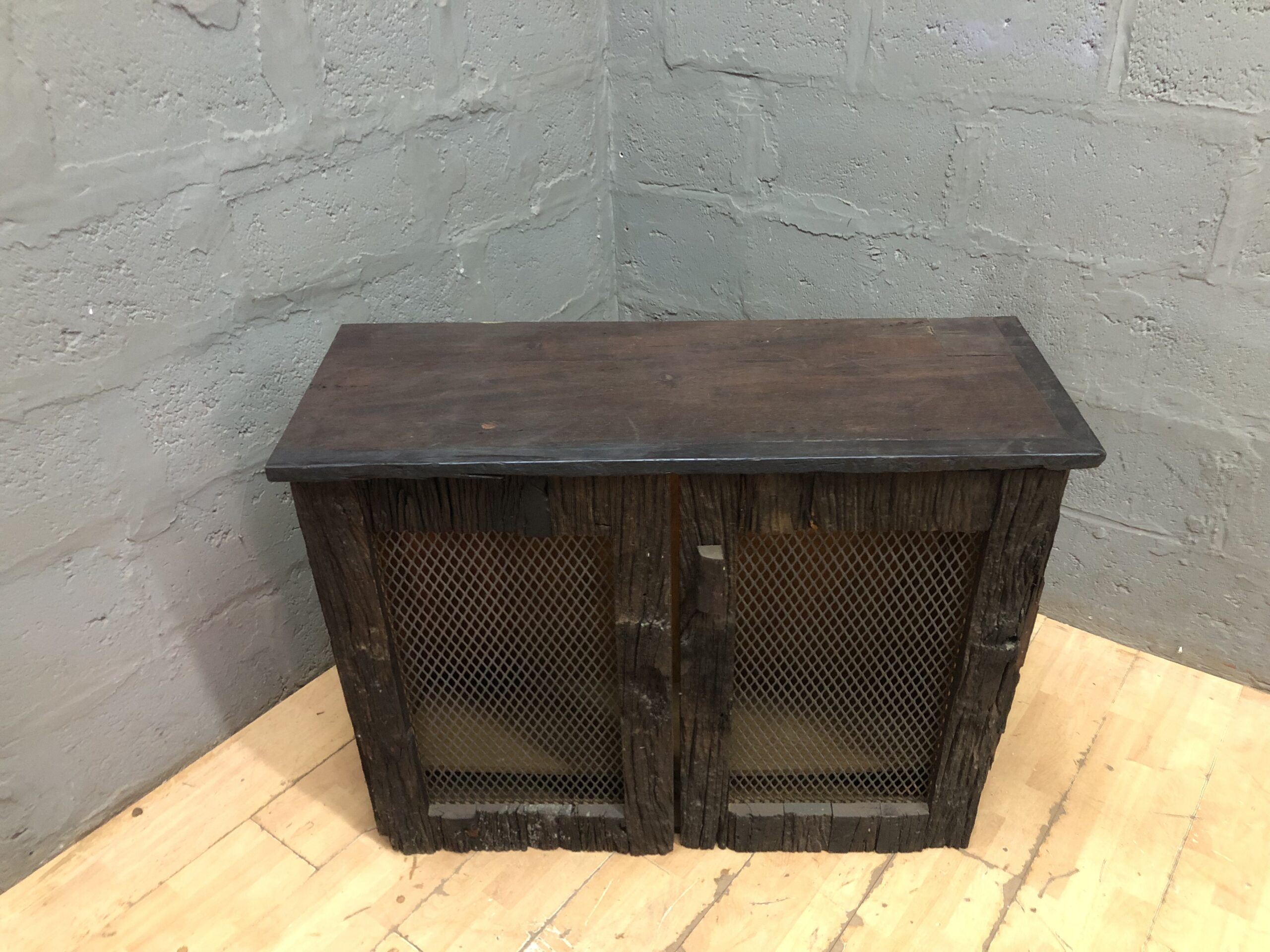 Small Two-Door Wooden Cabinet with Metal Mesh Doors (Used, Worn)