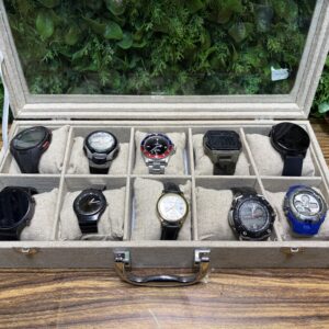 Lot of 10 Wristwatches in Glass-Top Display Case — Mixed Condition