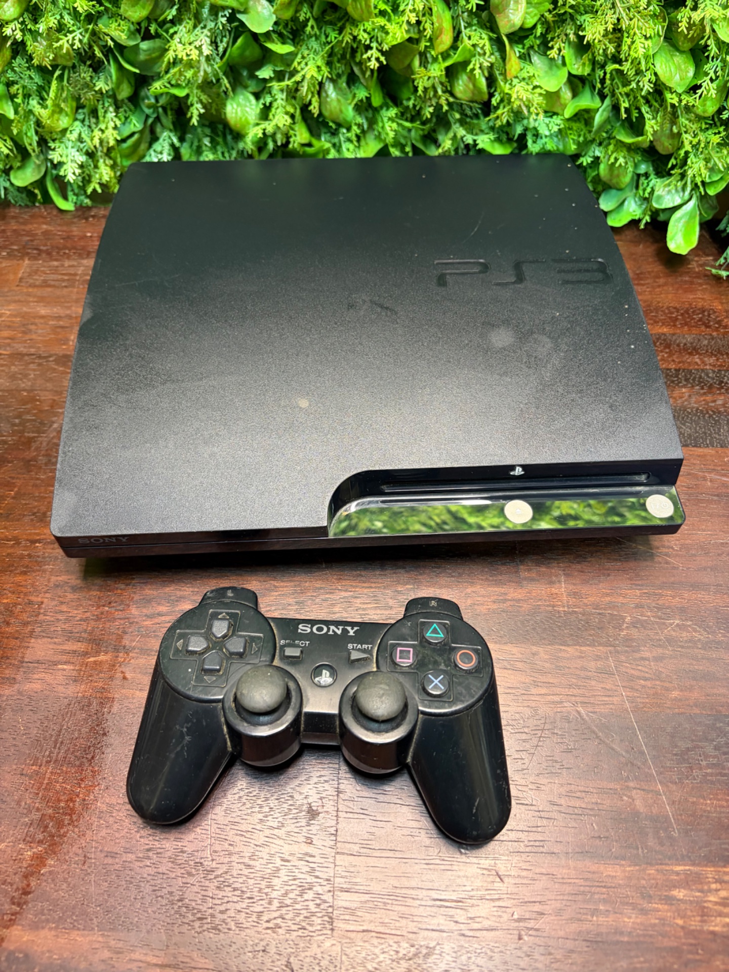 Sony PlayStation 3 Slim console with DualShock controller — Untested, cosmetic wear