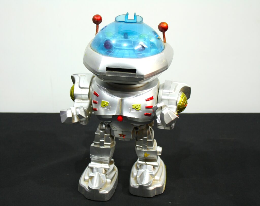 Silver Toy Robot with Translucent Blue Dome & Orange Antennae
