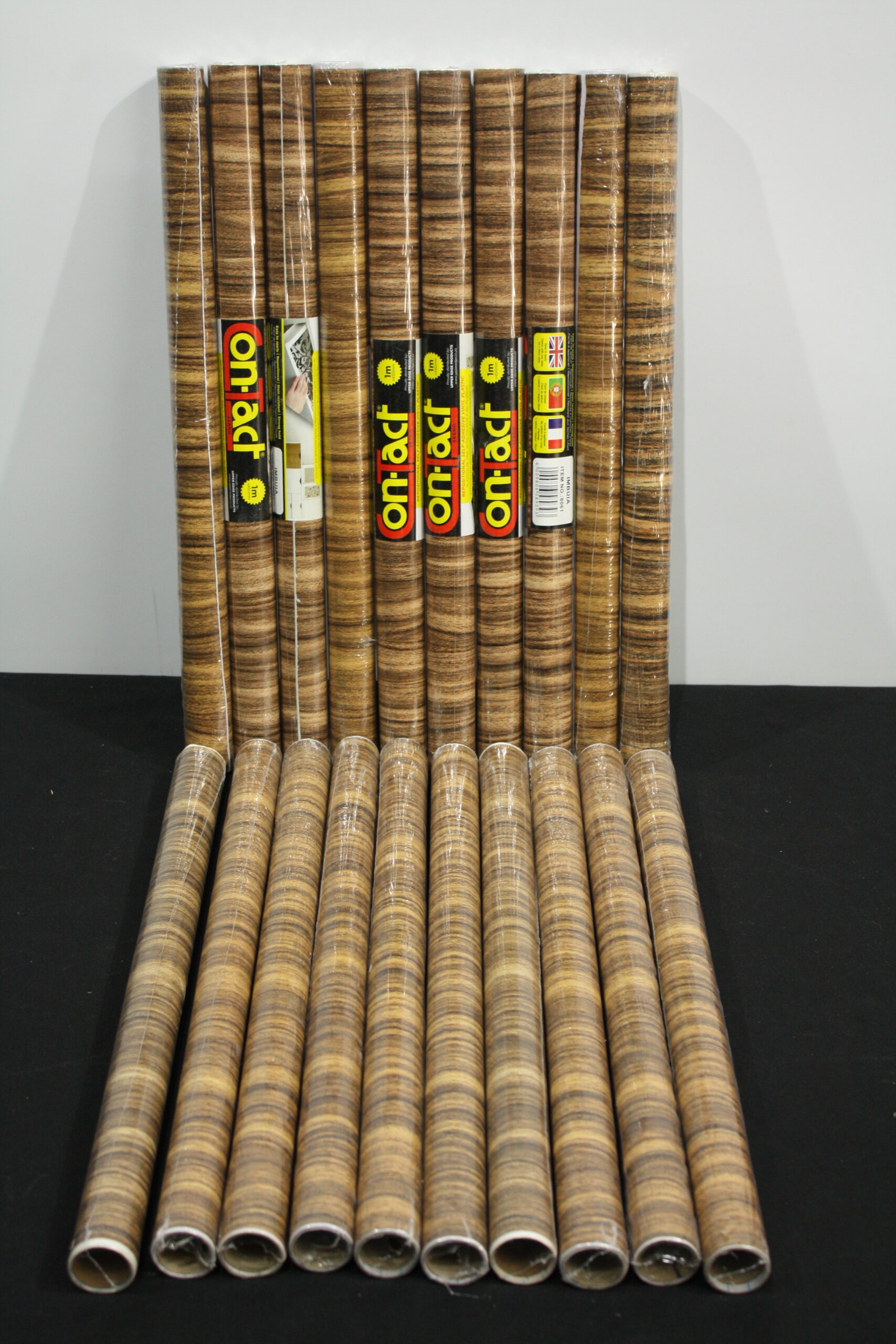 Bundle of Contact-Adhesive Wood-Grain Vinyl Rolls — Seller-Claim 20 Rolls (11 Shown)