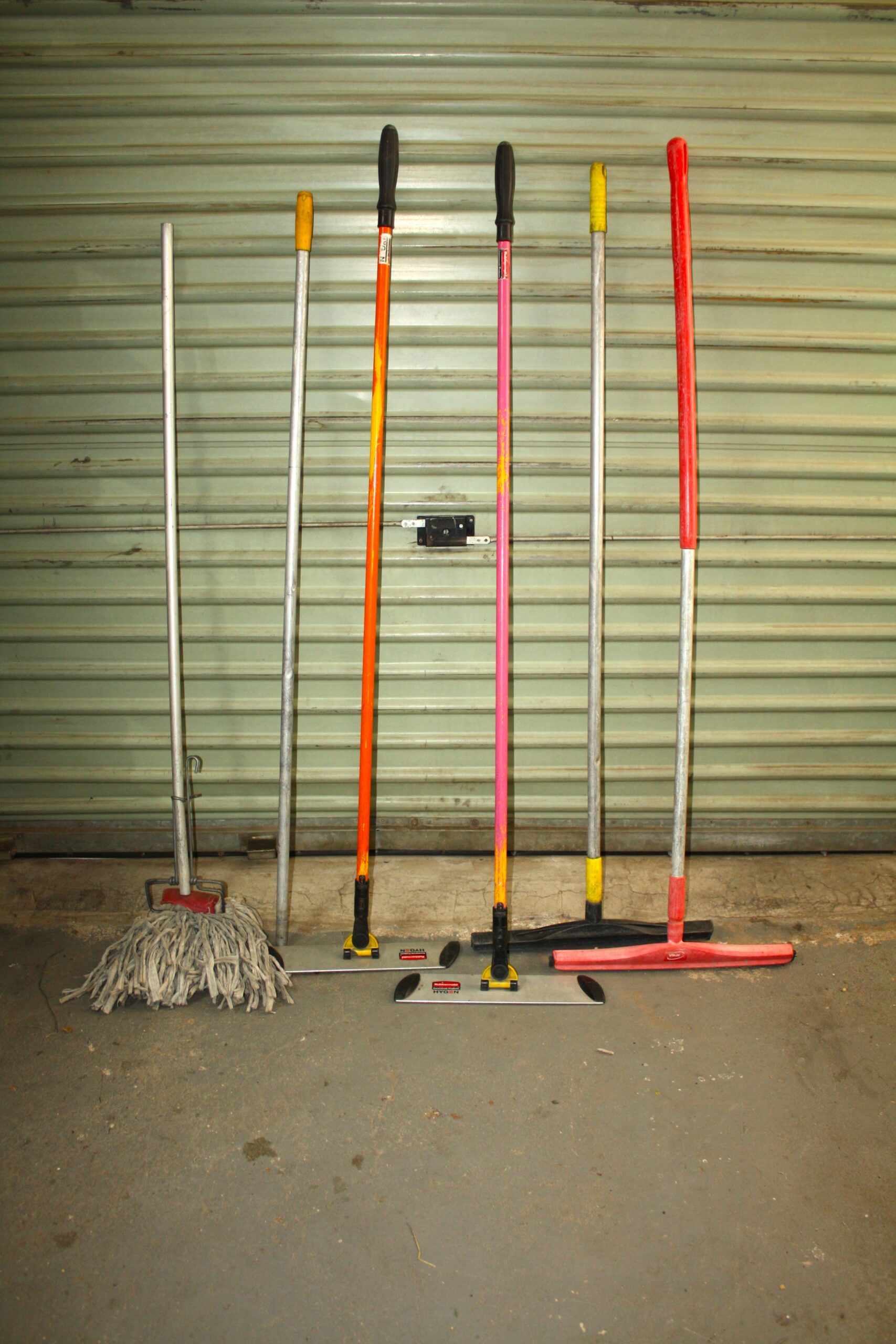 Lot of 6 Floor Cleaning Tools – Mops, Flat-Mop Frames & Squeegees (HYGEN plates visible)