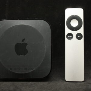 Apple TV set-top box with aluminum remote — sold as-is, no refund