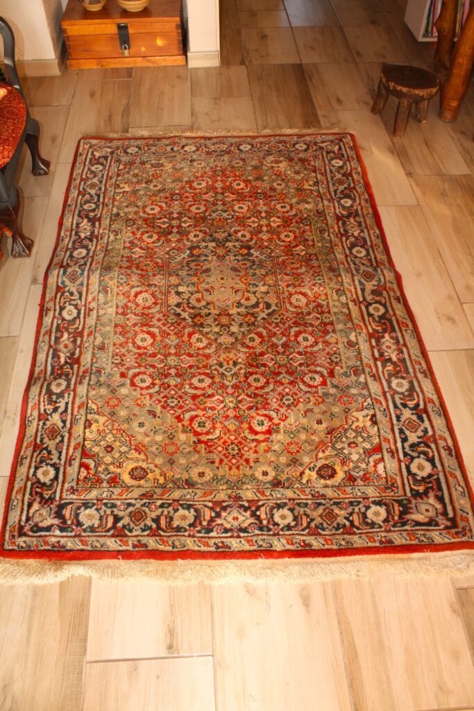 Colourful Persian-style Rug 1.8m x 1.2m – Used, Hole Claimed, Sold As-Is