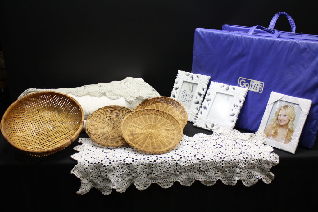 Household mixed lot: wicker baskets, crocheted linens, picture frames & GoFit bag
