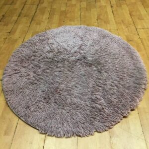 Round pink shaggy rug 121cm — non-slip dotted backing, used with marks