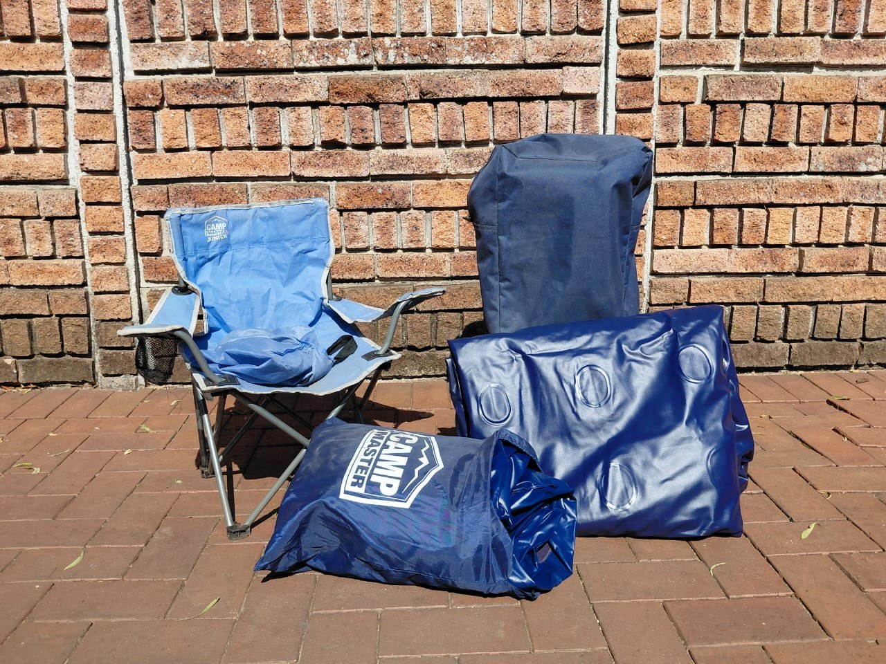 Camp Master fold-out double bed frame + 2 queen inflatable mattresses (slow leaks) + folding chair