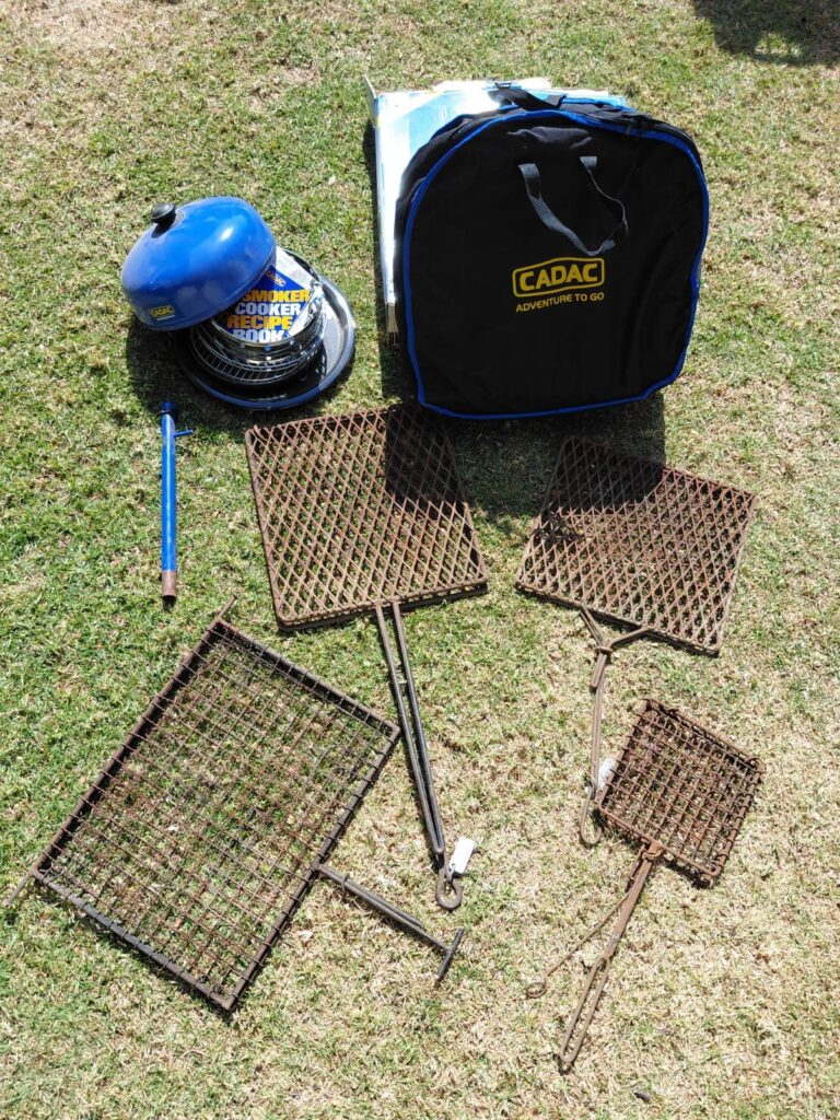 Cadac blue smoker cooker (Rokerkoker) + boxed Cadac skottelbraai — carry bag, manuals, heavy rusty grill plates