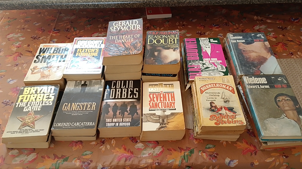 Mixed lot of adult fiction books — action & thriller titles (approx. 12–15)