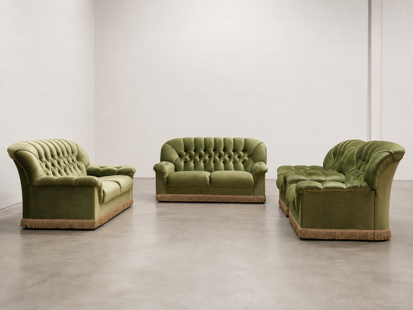 Olive-green button-tufted 1970’s upholstered seating set with decorative fringe