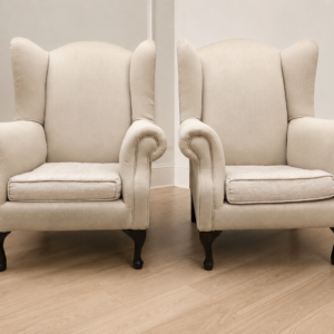 Pair of Beige Upholstered Wingback Armchairs with Removable Seat Cushions