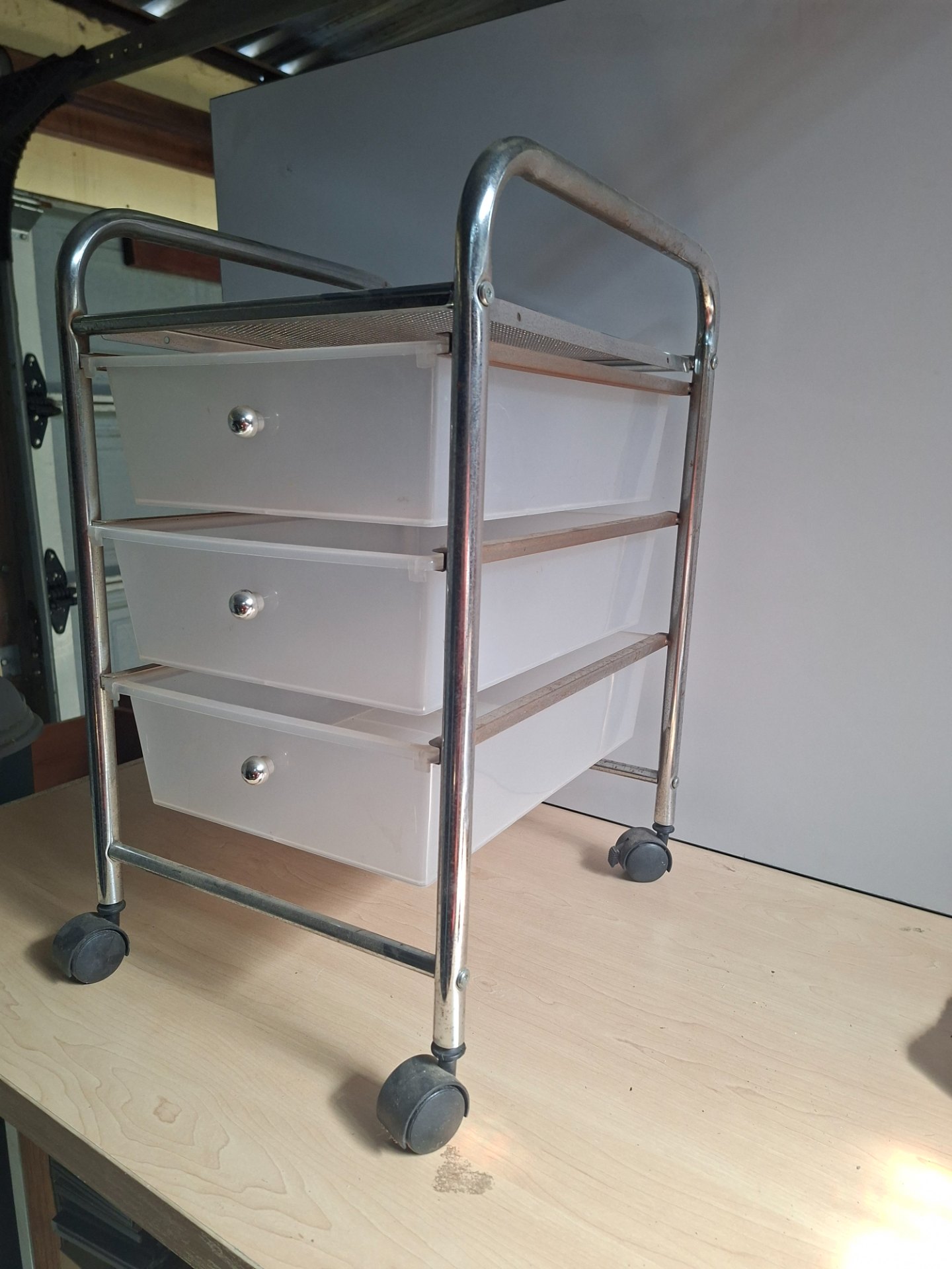 Chrome-frame Storage Trolley with 4 Clear Plastic Drawers on Castors – Perforated Top Shelf, ~55–56cm High