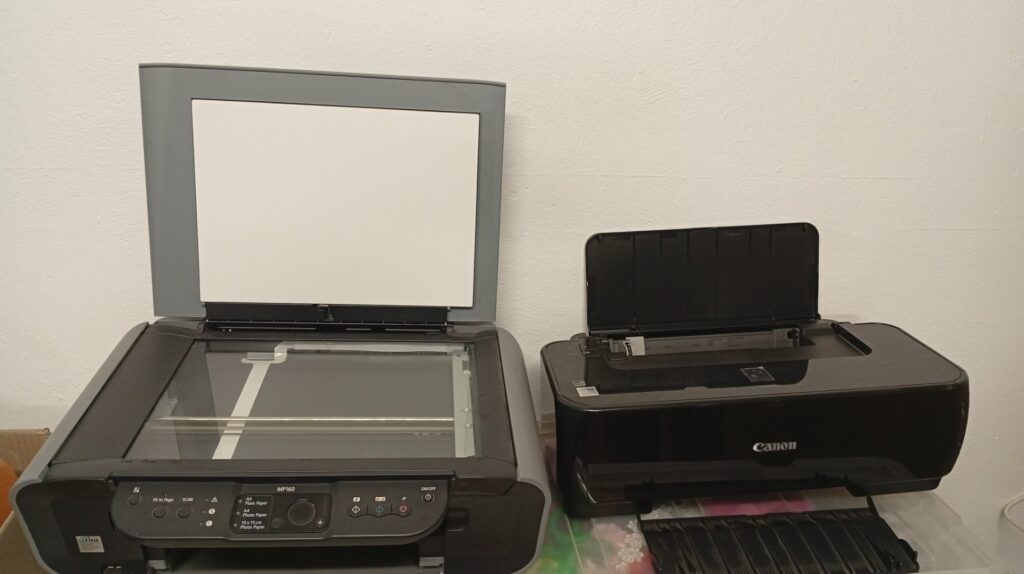 Two Canon printers – MP160 multifunction + iP1800 inkjet (used, worked last time; power cables only)