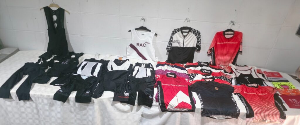 Mixed bulk lot of cycling kit — jerseys, bib-shorts and vests (used, various)