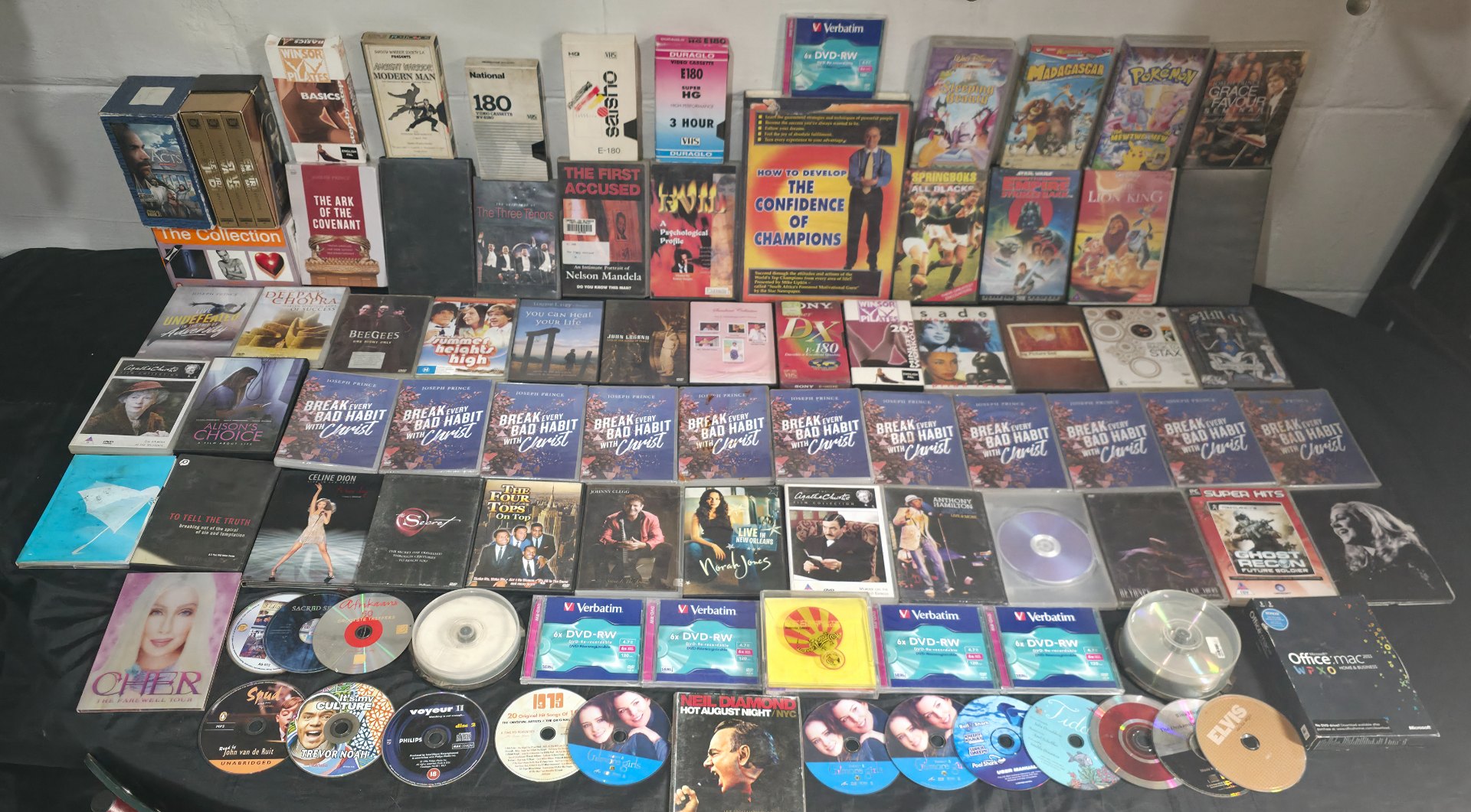 Lot of 93 Assorted Media — VHS tapes, Commercial DVDs, Audio CDs, Verbatim 6x DVD‑RW packs & spindles