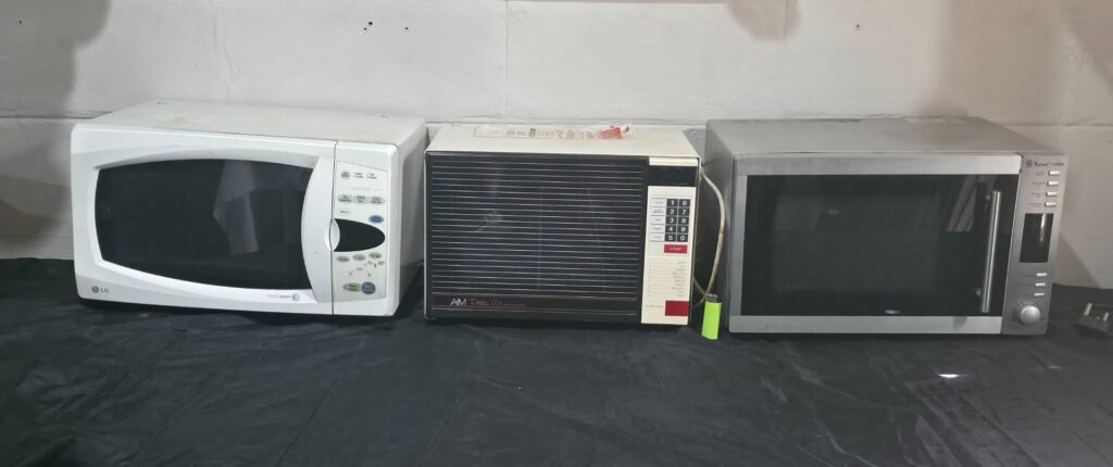 Lot of 3 Countertop Microwaves — LG, AIM, Russell Hobbs (Spares / Repairs)