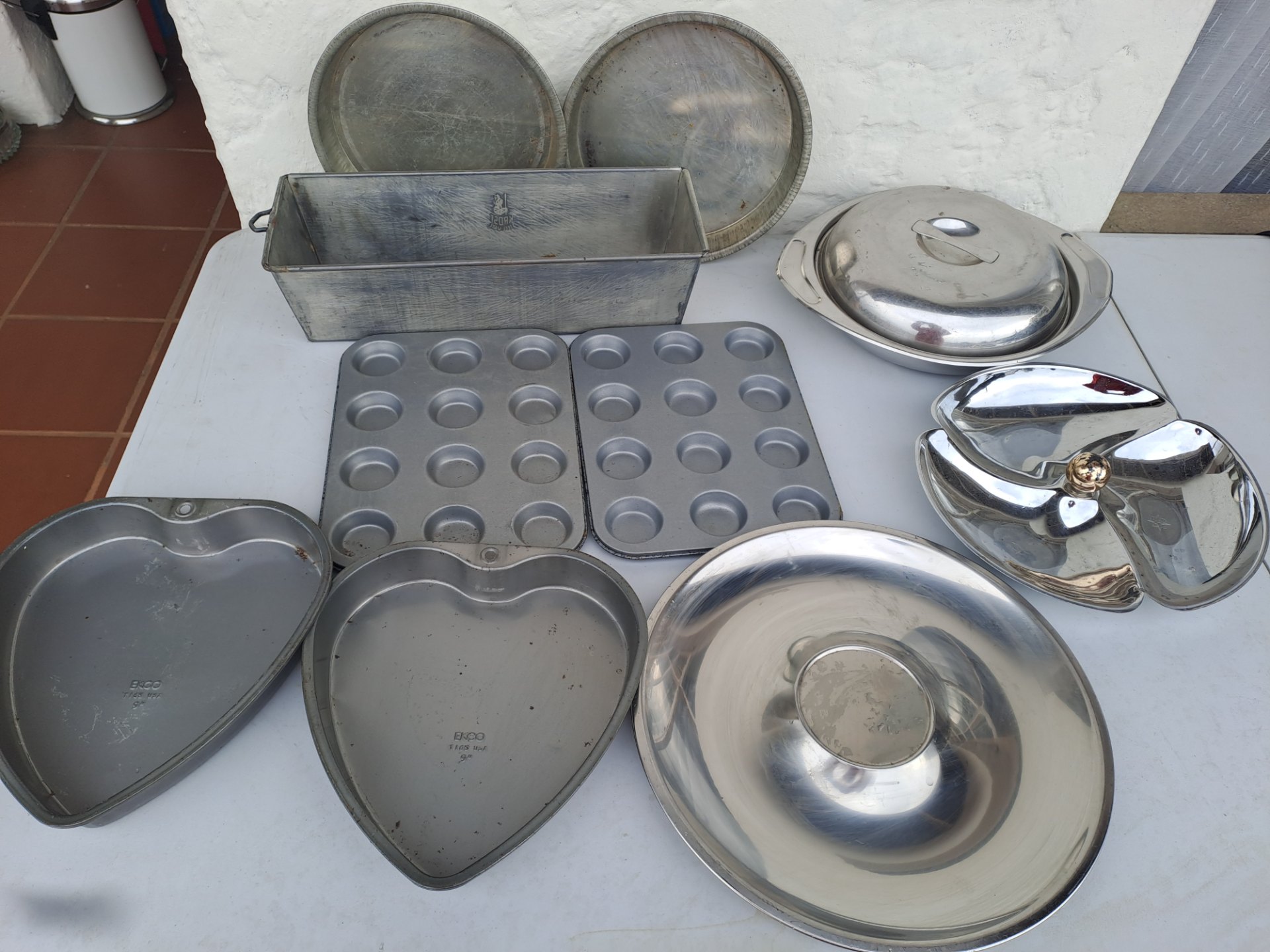 Mixed bakeware & serving set — EKCO heart tins, Rosti loaf tin, muffin pans, stainless bowls & serving dishes (used)