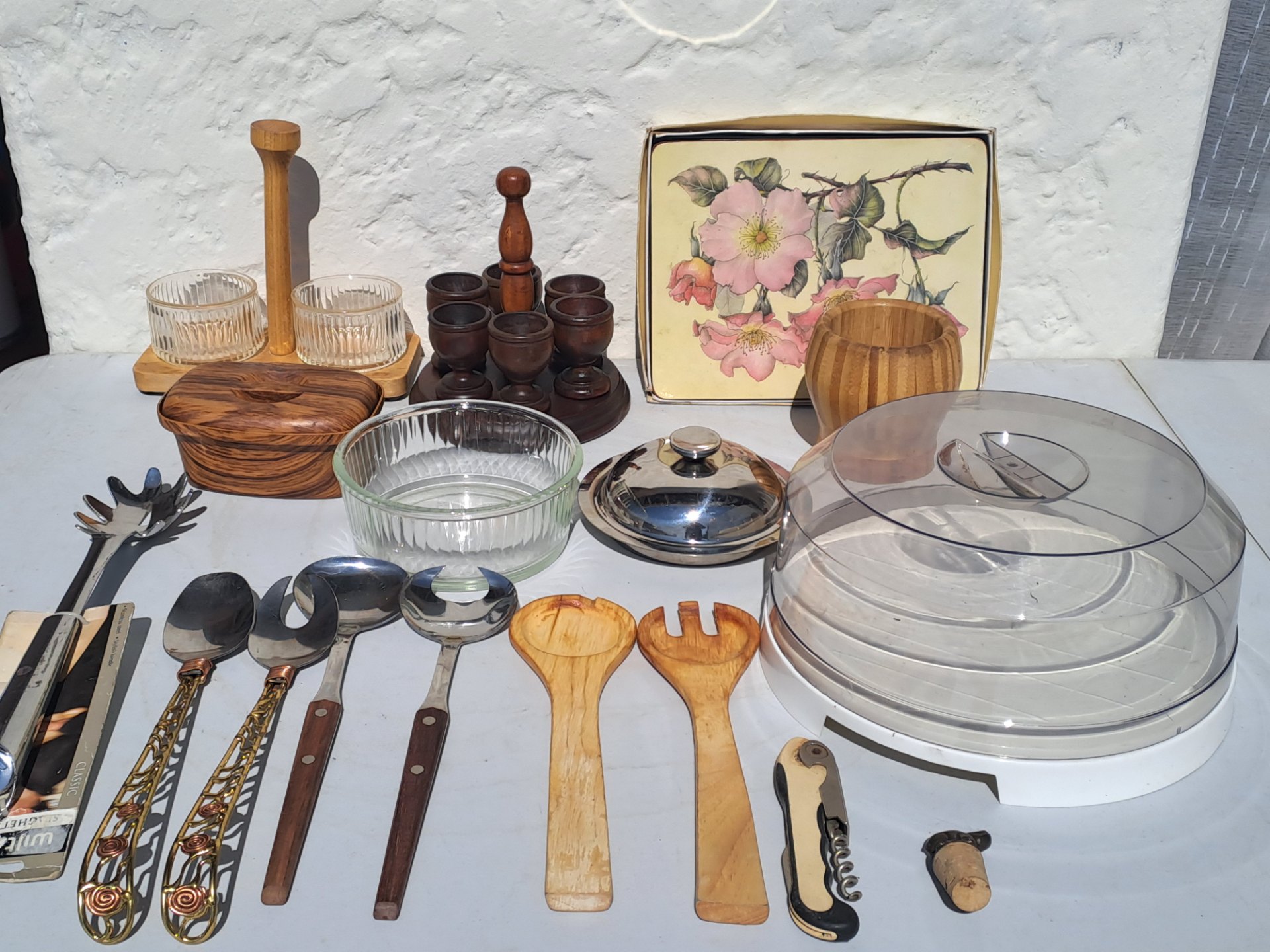 Mixed kitchen & serving lot — glass bowls, wooden utensils, metal servers, dome cover & accessories