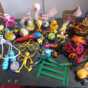 Mixed lot ~35 used children's toys — ducks, prams, pirate ship, red corded microphone (untested)
