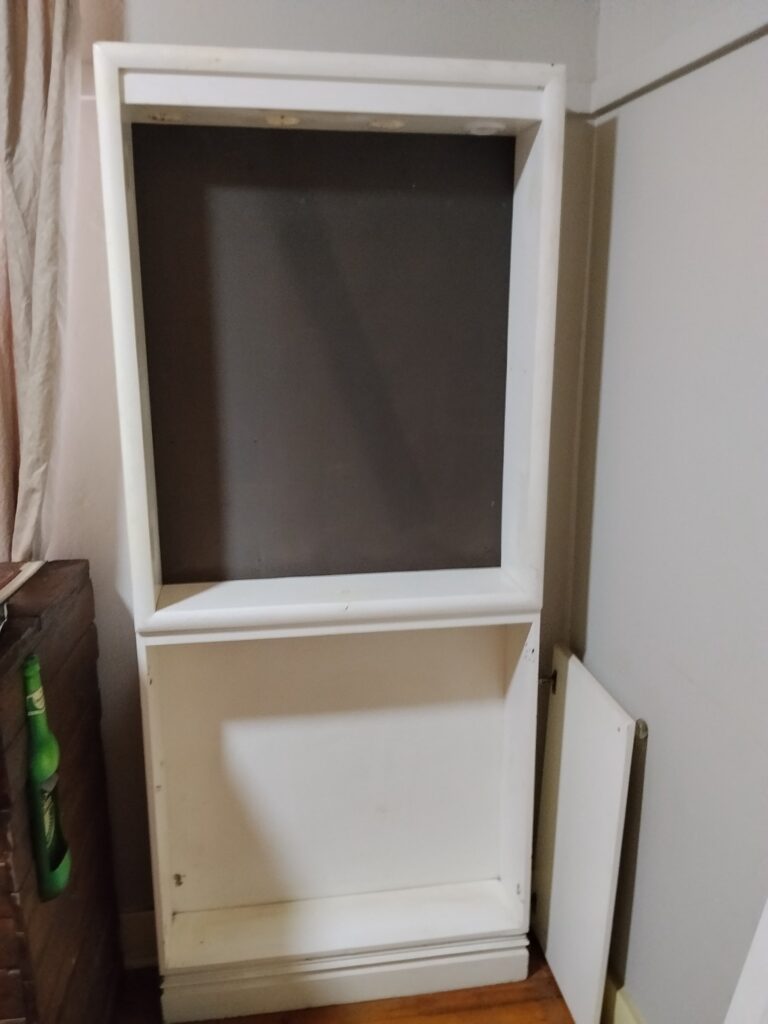 Tall painted white display cabinet / hutch — open top display, lower cupboard, crystal knobs