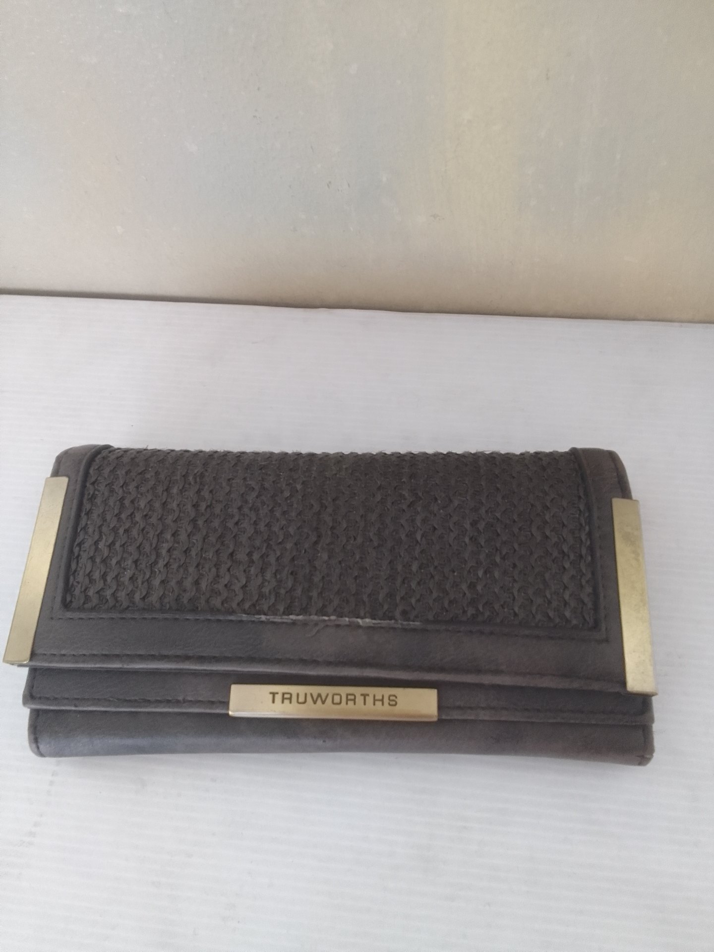 Ladies Truworths leather wallet / clutch — brown with brass trim, like-new (minor wear)