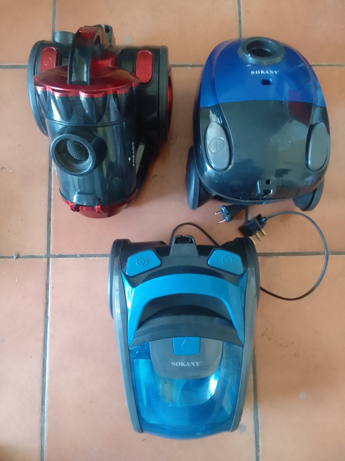 Lot of 3 Canister Vacuum Cleaners (two Sokany visible) — For Spares / Repairs, Not Working