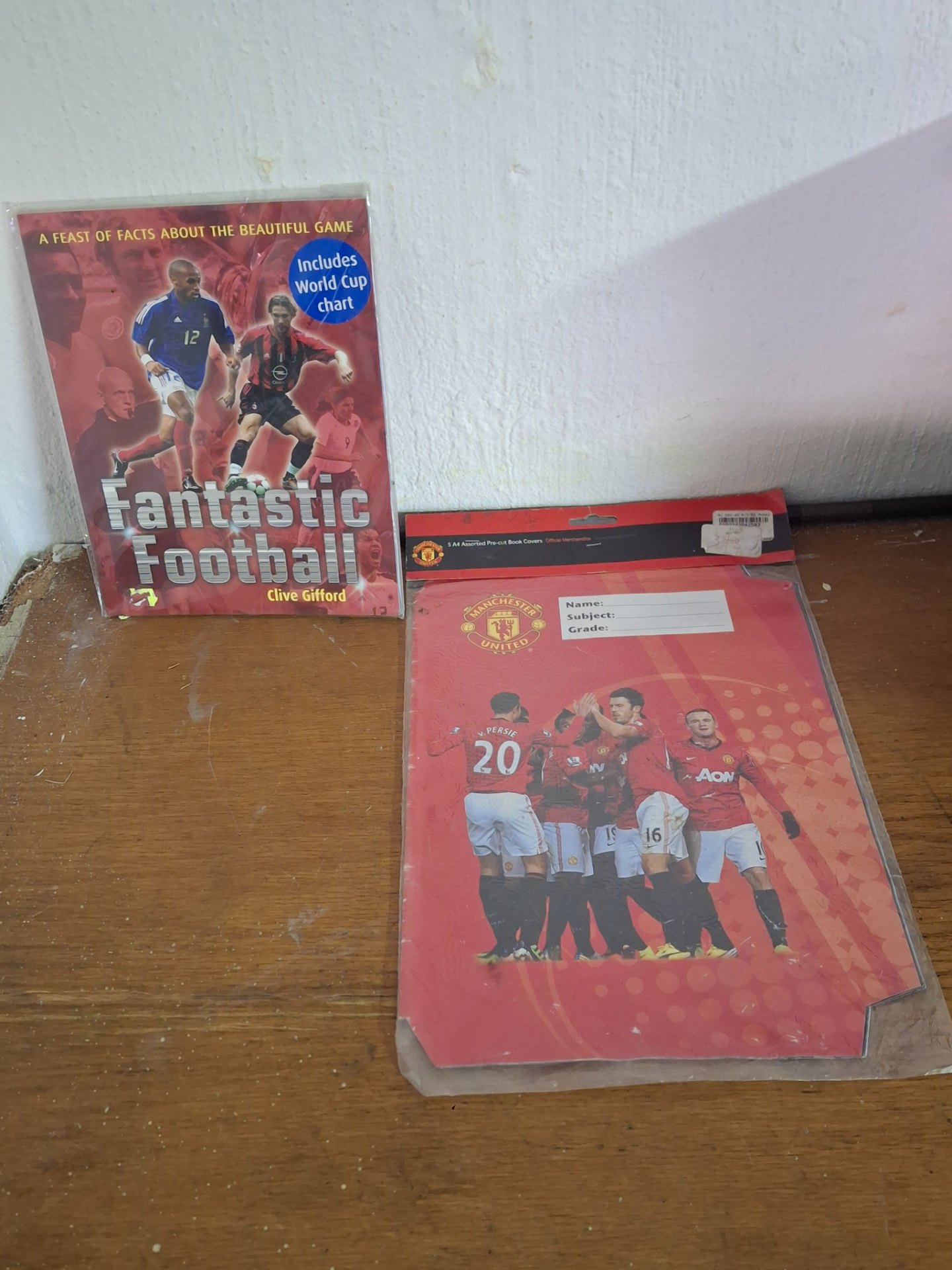 Fantastic Football (Clive Gifford) — sealed paperback + Manchester United A4 pre-cut book covers (sealed pack)
