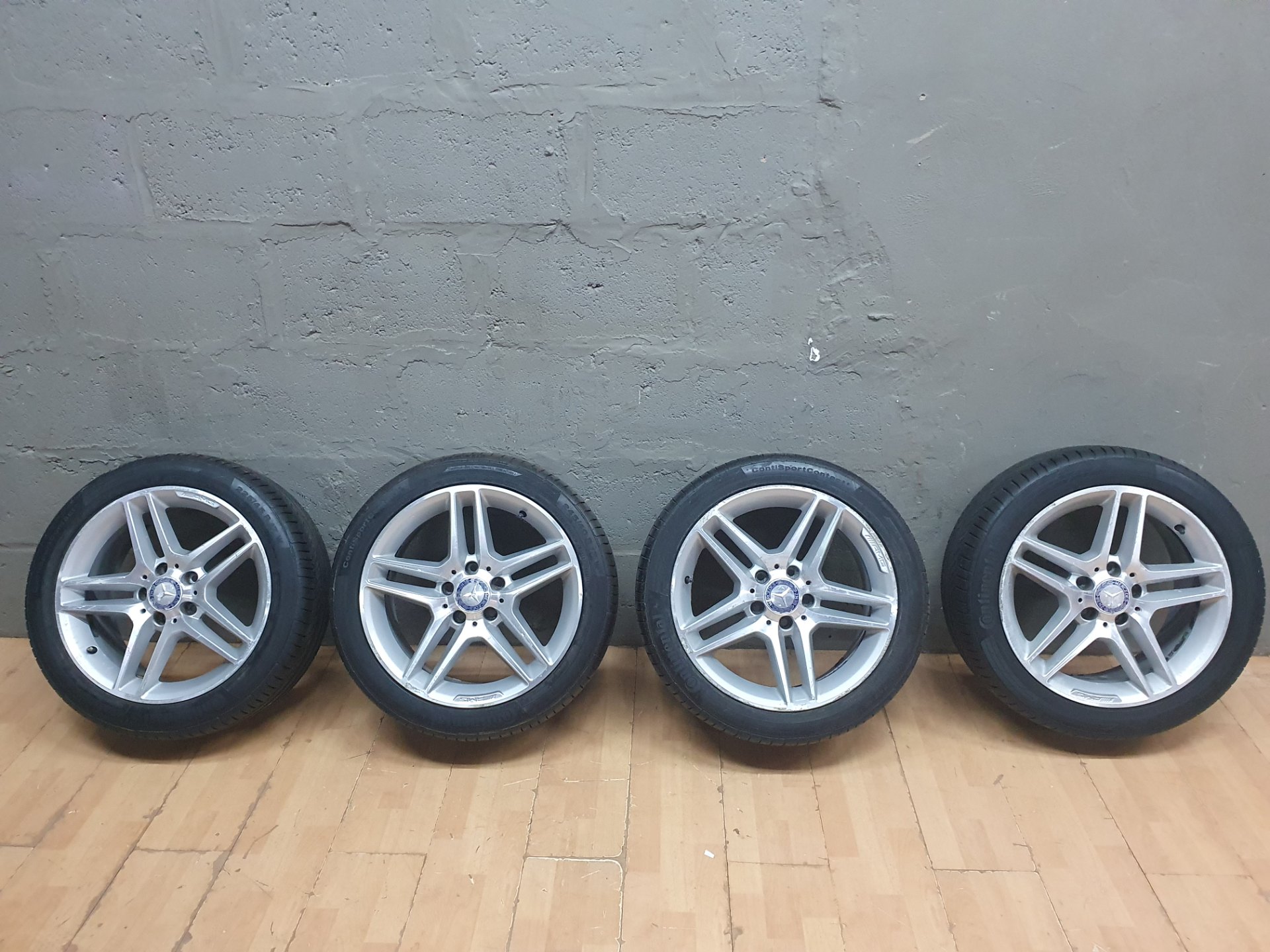 Set of 4 Mercedes AMG alloy wheels with Continental ContiSportContact 225/45 R17 tyres — used, curb rash & tyre cracking