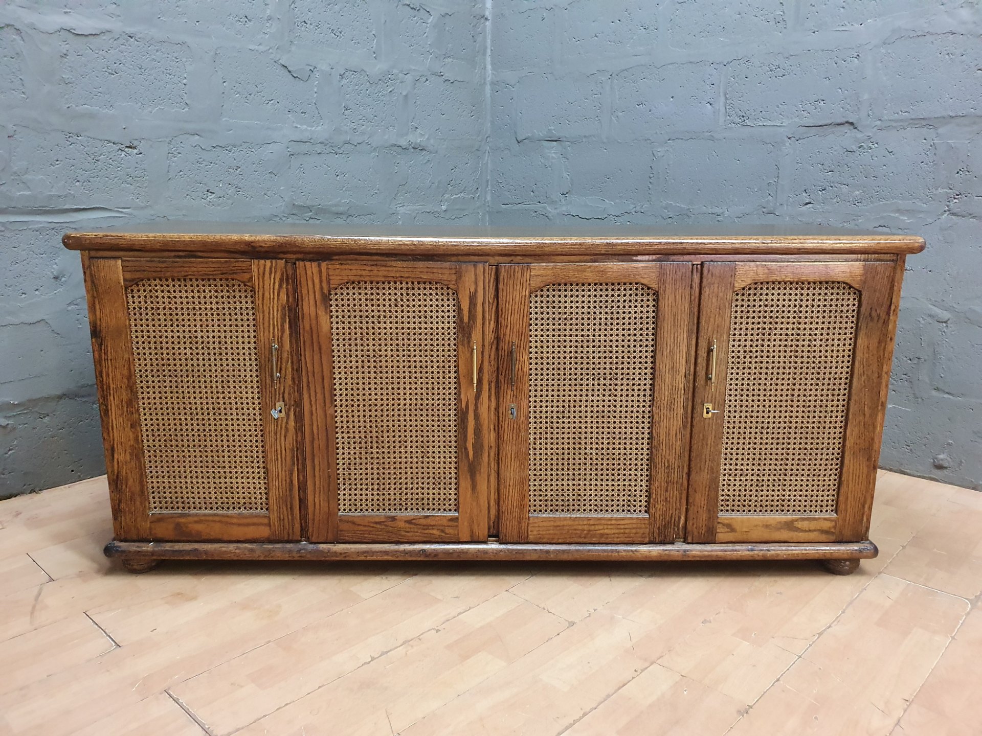 Large Four‑Door Wooden Sideboard / Credenza with Cane Panels, Internal Drawers & Felt Tray (79 x 183 x 56cm)