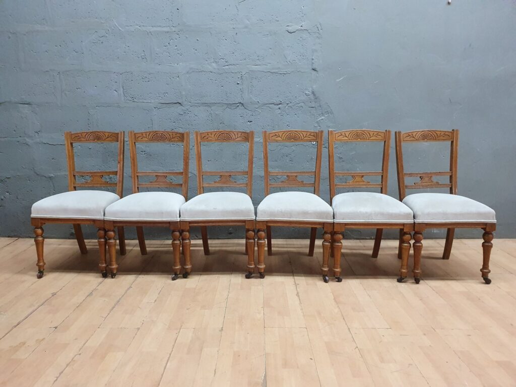 Set of 6 Carved Wooden Dining Chairs — Turned Legs, Castors, Carved Back Splats