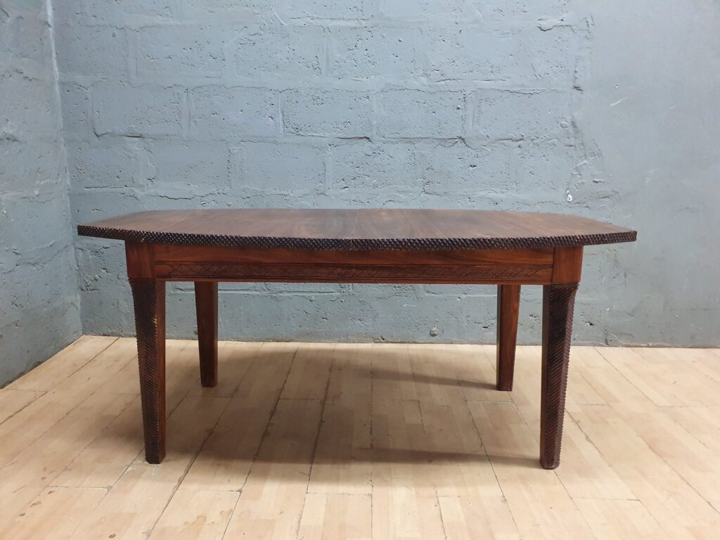 Carved wooden dining table — carved edge & legs, two-piece top (170 x 100 x 77cm) — used, cosmetic wear