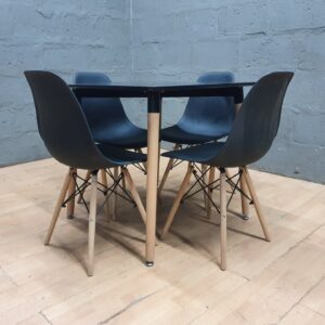 5‑piece dining set — square black table + 4 black plastic‑shell chairs (80x80x75 cm)