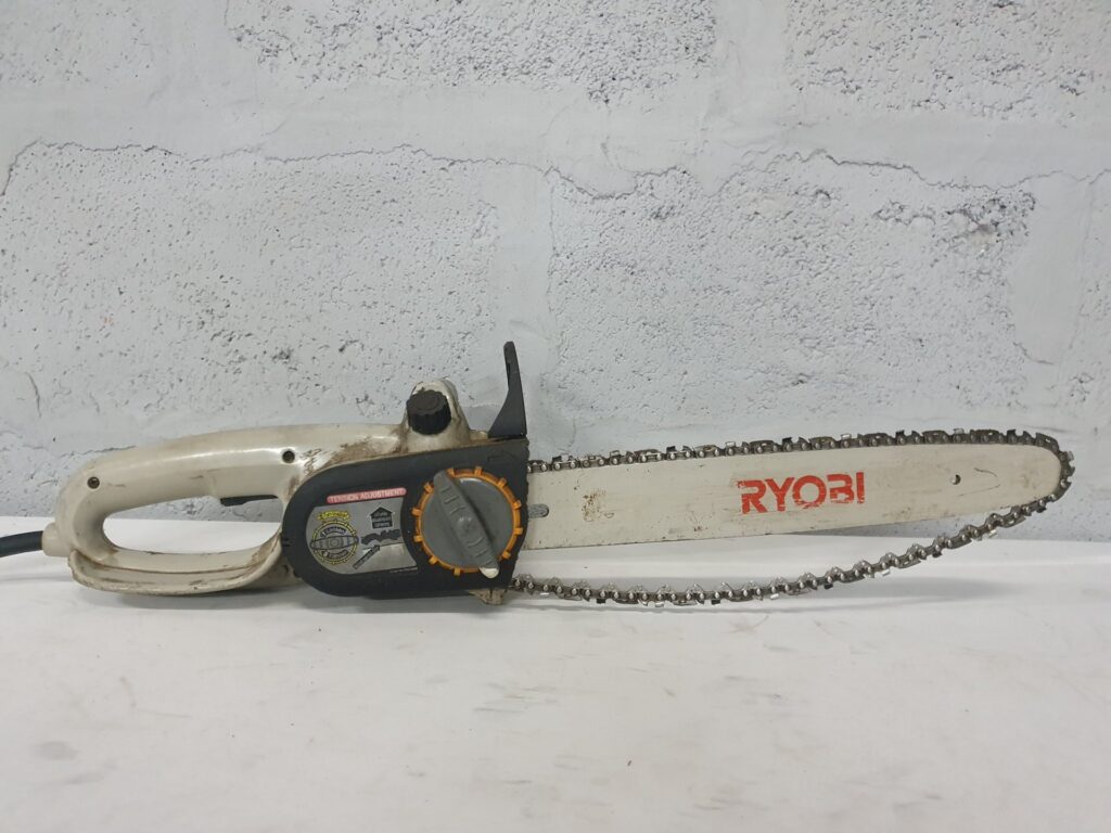 Ryobi Electric Chainsaw with Guide Bar & Chain — Used, Tested; Chain Worn, Power Cord Damaged