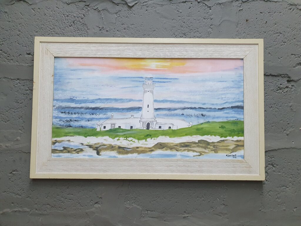 Framed signed canvas seascape (lighthouse) — 80 × 49 cm, painted surface intact, framed & ready to hang