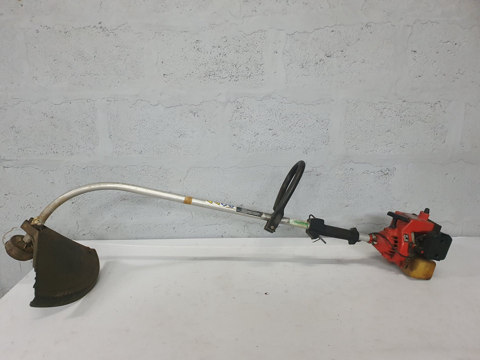 Homelite ST-175G petrol brushcutter / string trimmer – used, not working (for repair or parts)