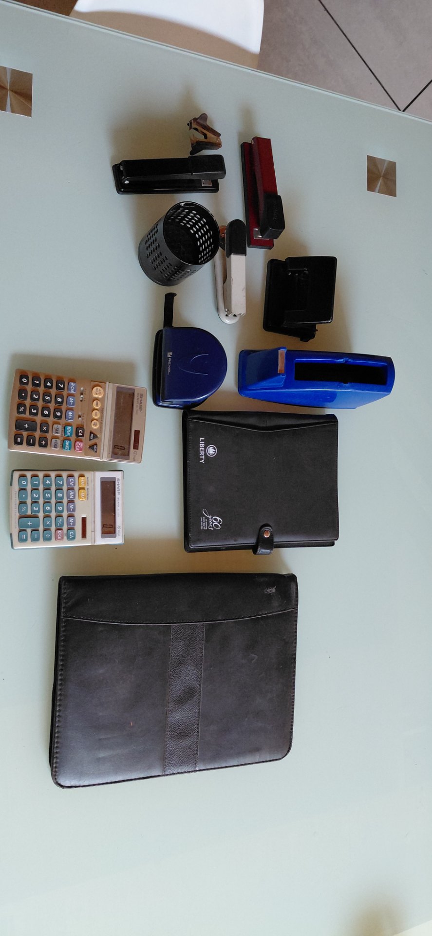 Lot 06 — Mixed Stationery: 2 Sharp Calculators (working) + Staplers, Tape Dispenser, Pen Cup & Folios — Used