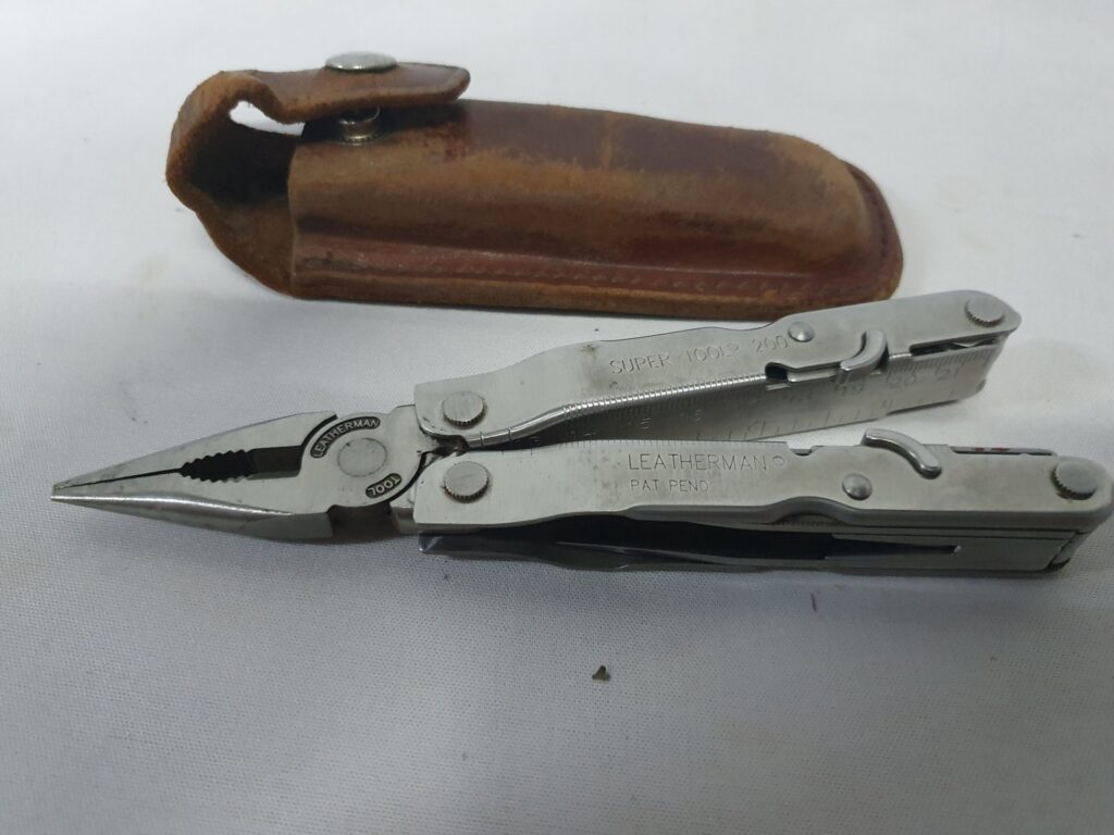 Leatherman Super Tool 200 stainless multi-tool with leather belt sheath