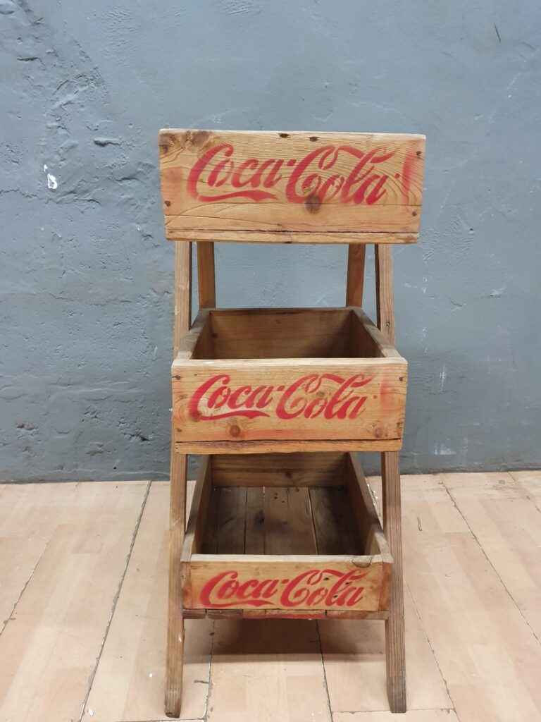 Three‑Tier Wooden Coca‑Cola Crate Display Stand — Stencilled Red Logo, Rustic Retail Unit