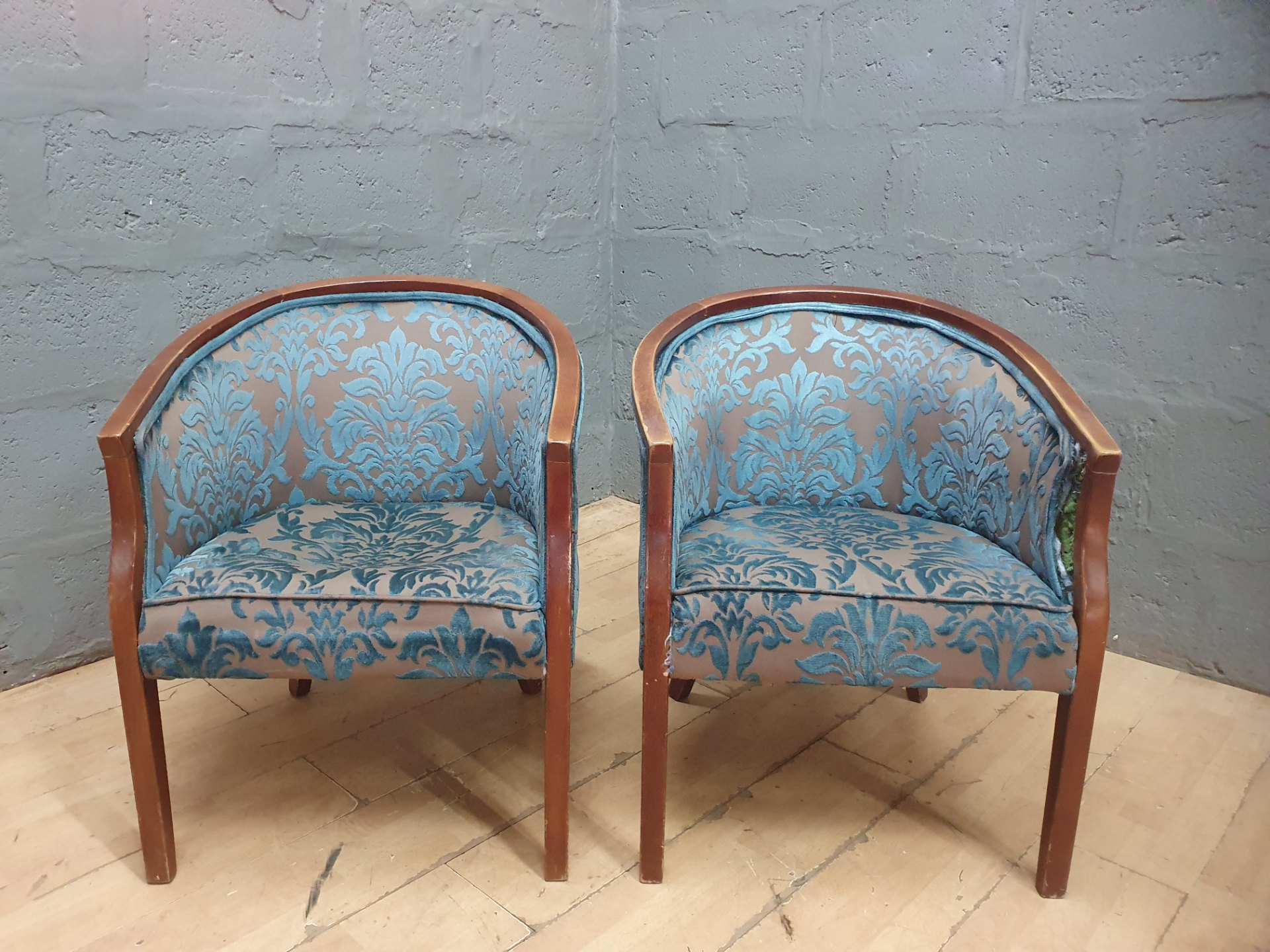 Pair of small tub / barrel armchairs — blue damask upholstery, wooden frame (sold as pair)