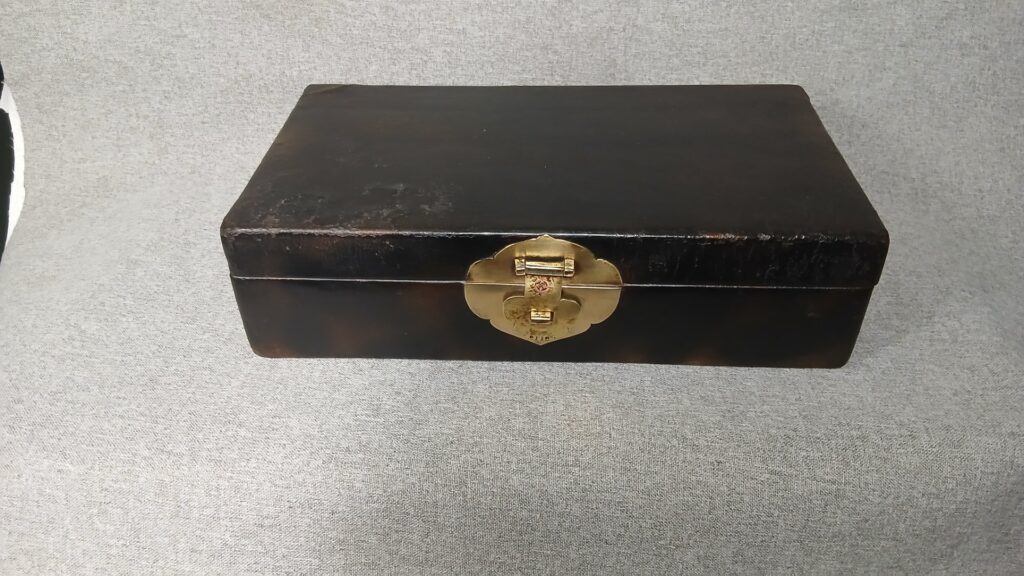 Dark lacquered storage box with brass latch & side handle — 35 x 19 x 9 cm