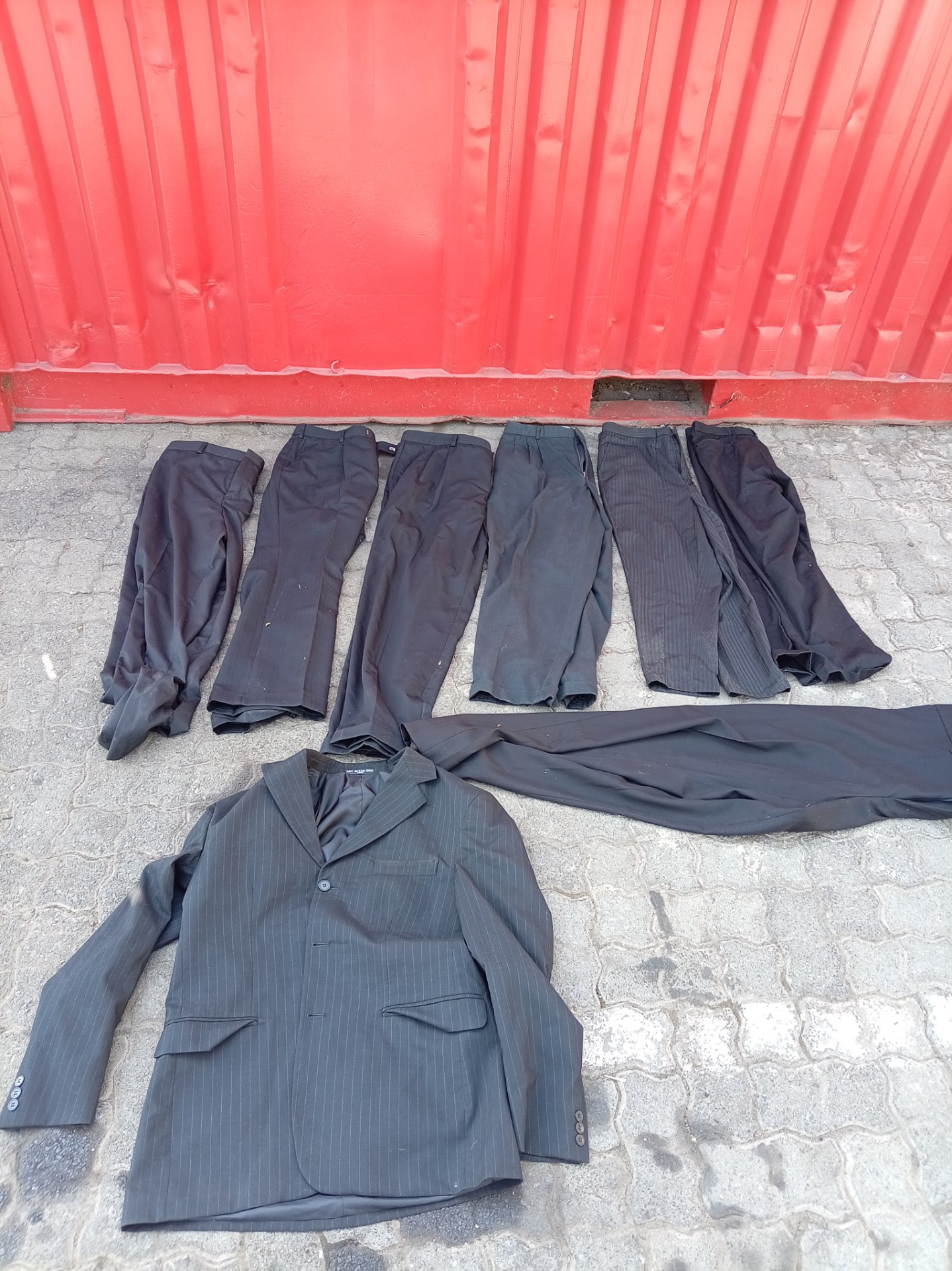 Joblot: Men’s pinstripe blazer + 7 smart trousers — assorted sizes, used with visible creasing & marks