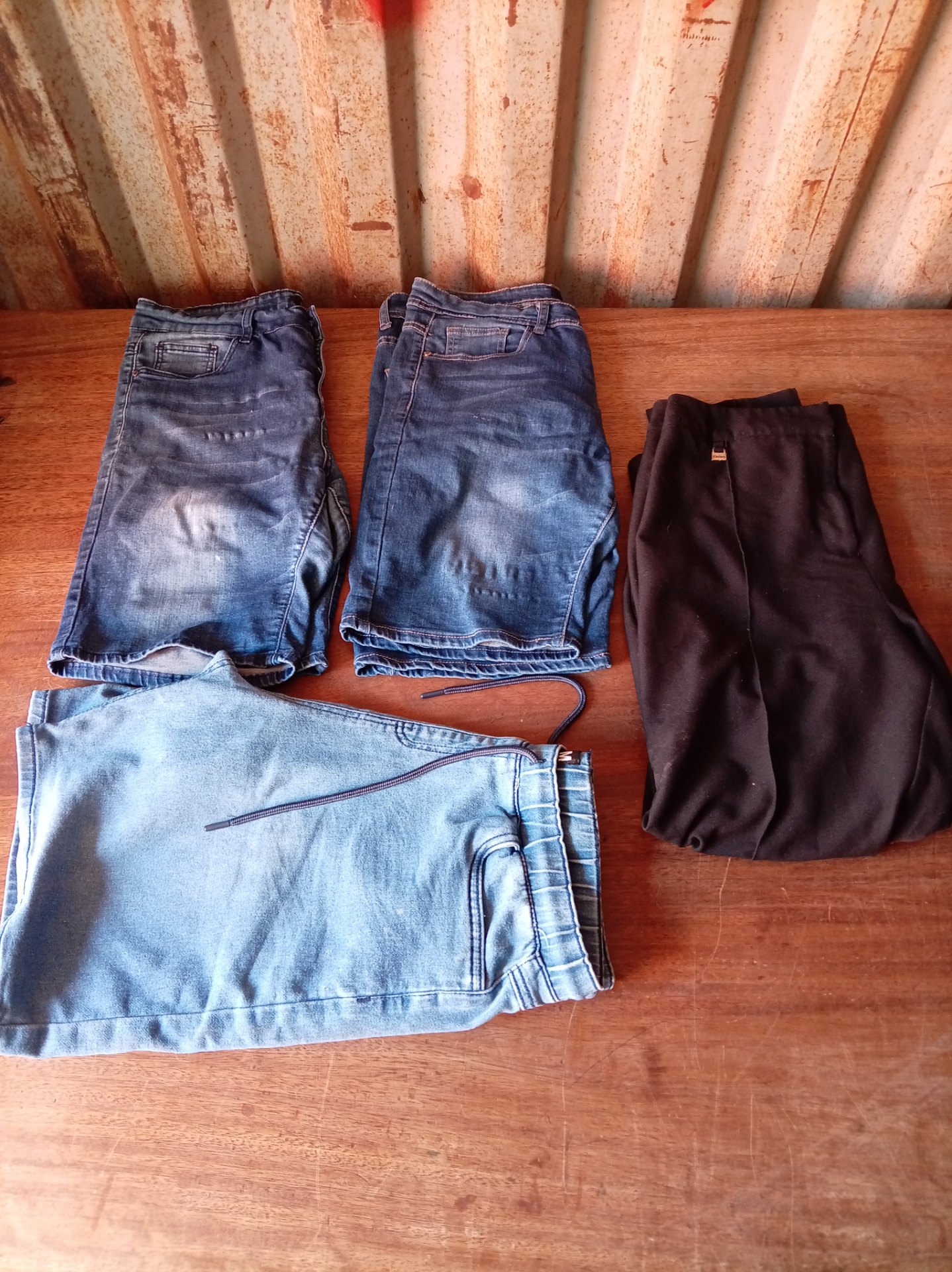 Mixed lot 4x ladies bottoms — denim shorts (Blue Sky), light-blue drawstring shorts and Kelso black pants (label shows size 12)