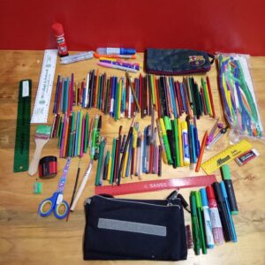 Mixed used school & art stationery lot — pencils, coloured pencils, pens, markers, rulers, glue, cases