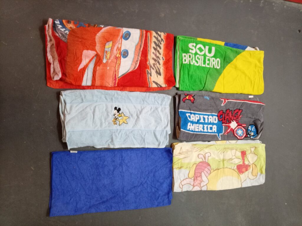 Lot of 6 Mixed Licensed Kids Towels — Cars, Mickey, Captain America + plain colours, used with visible wear