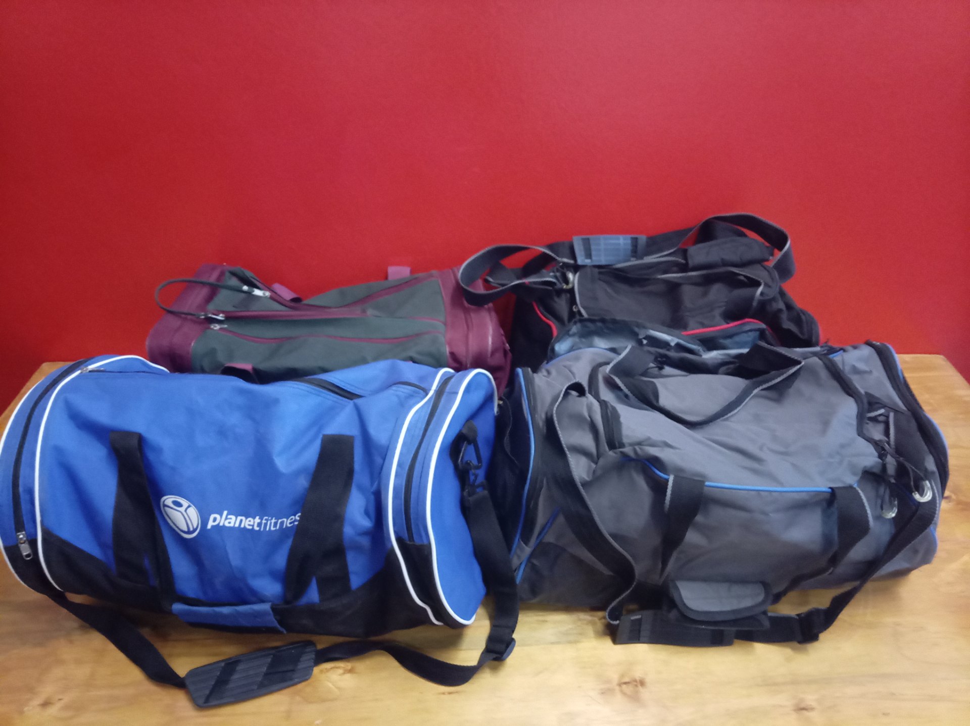 Lot of 4 Duffel / Gym Bags (mixed brands) — used, one with broken zip & lining damage