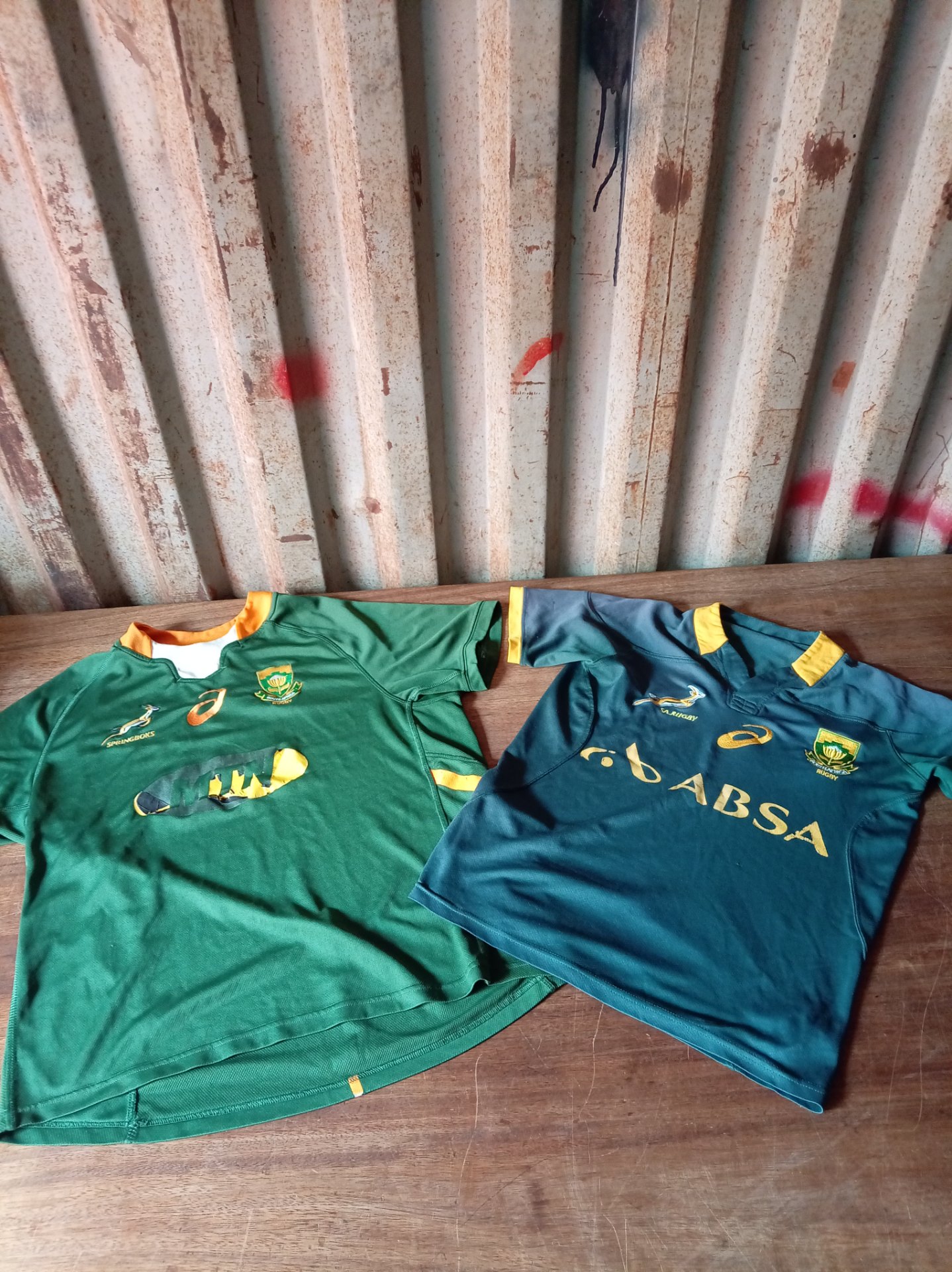Lot of 2 ladies Springbok rugby shirts (labelled XL) — Asics logos, used with visible damage